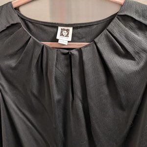 Silky black Anne Klein pull-over blouse, pleated at the neckline. Size L